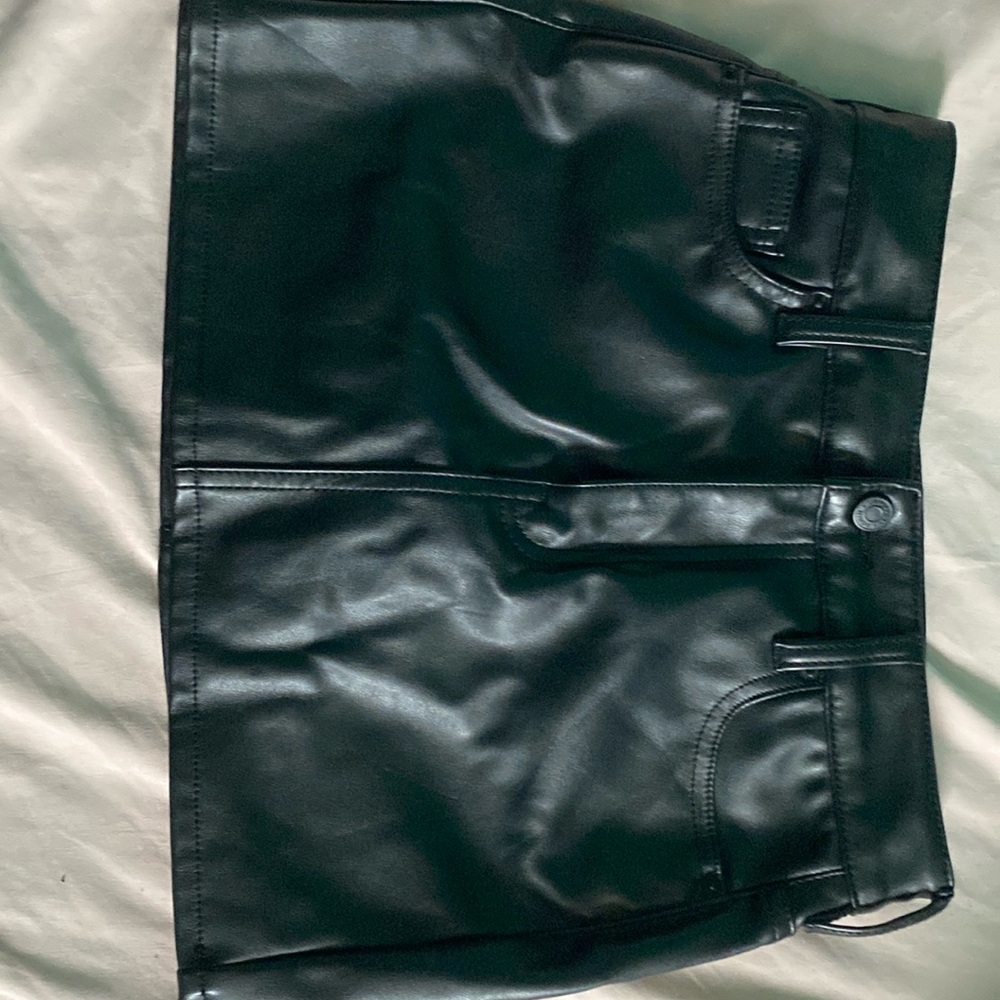 Black leather mini skirt